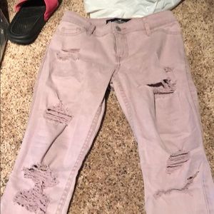 Purple/pink ripped skinny jeans